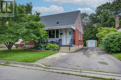 View of front of home featuring a front lawn and a storage unit - 177 Ontario Street, Brantford, ON - Outdoor