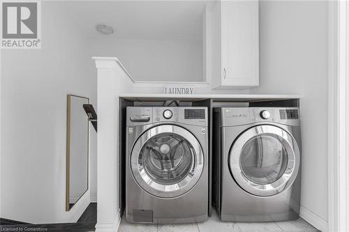 Laundry area featuring washer and clothes dryer - 143 Ridge Road Unit# 68, Cambridge, ON - Indoor Photo Showing Laundry Room