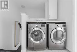 Laundry area featuring washer and clothes dryer - 