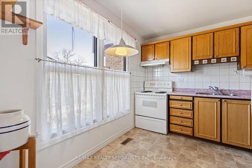 44 - 6650 Falconer Drive, Mississauga, ON - Indoor Photo Showing Kitchen With Double Sink