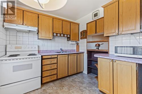 44 - 6650 Falconer Drive, Mississauga, ON - Indoor Photo Showing Kitchen With Double Sink