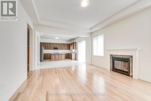 134 Goodwin Crescent, Milton, ON - Indoor Photo Showing Living Room With Fireplace