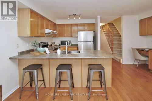 118 - 5030 Heatherleigh Avenue, Mississauga, ON - Indoor Photo Showing Kitchen With Double Sink