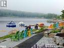 Owners Beachfront - 1235 Deerhurst Drive Unit# 51-208, Huntsville, ON  - Outdoor With Body Of Water With View 