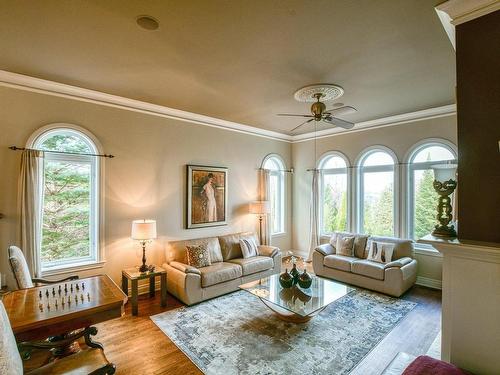 Living room - 45 Ch. Des Amarantes, Sainte-Anne-Des-Lacs, QC - Indoor Photo Showing Living Room With Fireplace