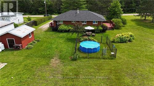 125 Griffith Wagner Road, North Algona Wilberforce, ON - Outdoor With Above Ground Pool With Backyard