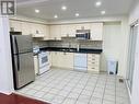 Upper - 92 Four Seasons Circle, Brampton, ON  - Indoor Photo Showing Kitchen With Double Sink 