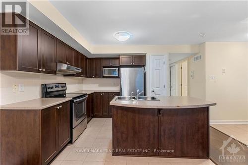 2 - 135 Bluestone, Ottawa, ON - Indoor Photo Showing Kitchen With Stainless Steel Kitchen With Double Sink