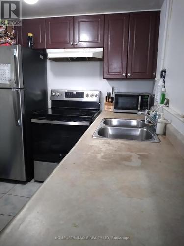 12 - 200 Mclevin Avenue, Toronto, ON - Indoor Photo Showing Kitchen With Double Sink