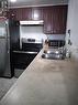 12 - 200 Mclevin Avenue, Toronto, ON  - Indoor Photo Showing Kitchen With Double Sink 