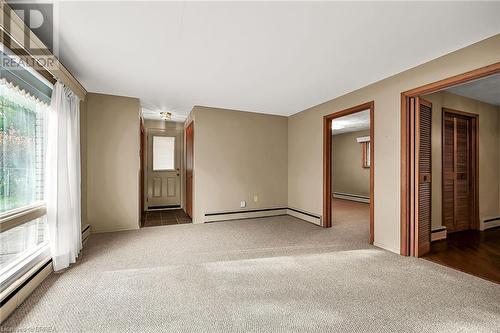 New carpeting - 16 Harvest Lane, Brantford, ON - Indoor Photo Showing Other Room