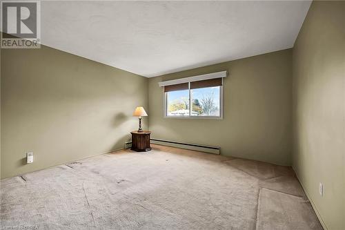 Large bedroom with oversize double closets - 16 Harvest Lane, Brantford, ON - Indoor Photo Showing Other Room