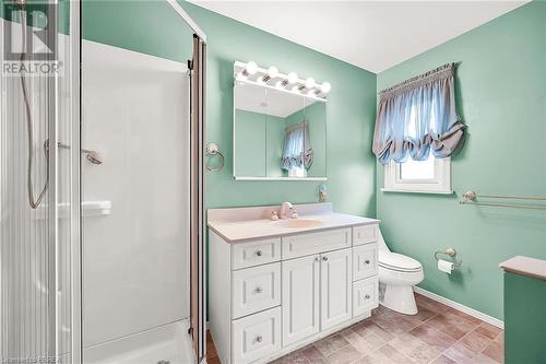 Bathroom featuring vanity, toilet, jacuzzi tub and a stand alone shower - 16 Harvest Lane, Brantford, ON - Indoor Photo Showing Bathroom