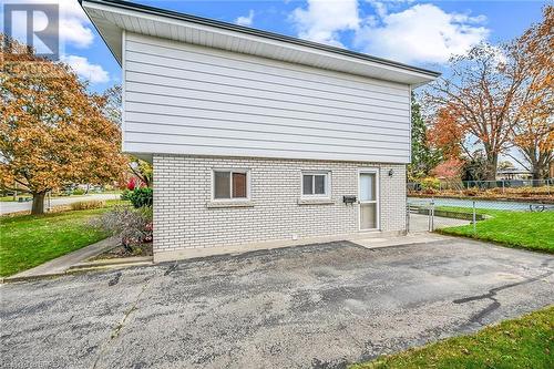 View of side of property with sufficient space and zoning to permit a garage or carport - 16 Harvest Lane, Brantford, ON - Outdoor