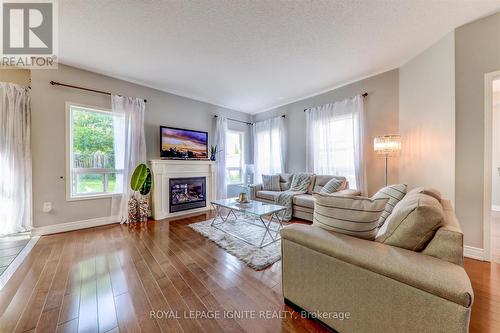 1547 Spencely Drive, Oshawa, ON - Indoor Photo Showing Living Room With Fireplace