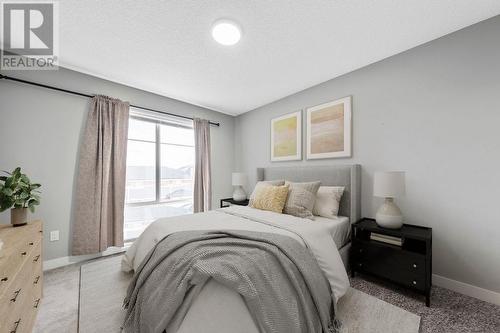 Virtual Staging - Master - 510, 95 Skyview Close Ne, Calgary, AB - Indoor Photo Showing Bedroom