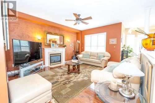 12 Branstone Drive, Whitby, ON - Indoor Photo Showing Living Room With Fireplace