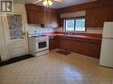 11242 91 Street, Peace River, AB  - Indoor Photo Showing Kitchen With Double Sink 