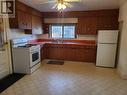 11242 91 Street, Peace River, AB  - Indoor Photo Showing Kitchen With Double Sink 