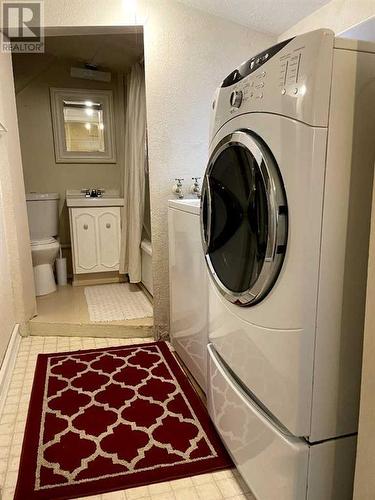 5123 50 Street, Consort, AB - Indoor Photo Showing Laundry Room