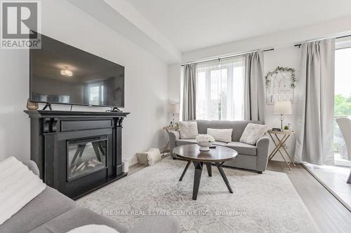 30 - 690 Broadway, Orangeville, ON - Indoor Photo Showing Living Room With Fireplace