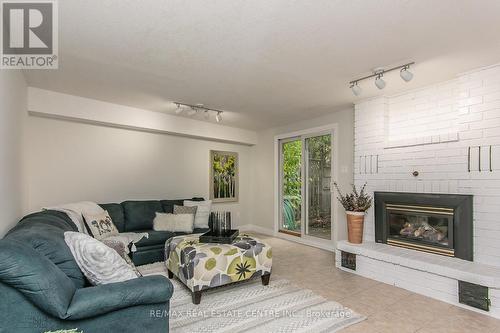 6 - 511 Oakvale Drive, Waterloo, ON - Indoor Photo Showing Living Room With Fireplace