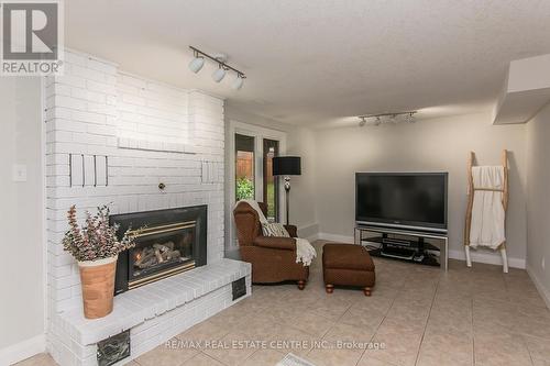 6 - 511 Oakvale Drive, Waterloo, ON - Indoor Photo Showing Living Room With Fireplace