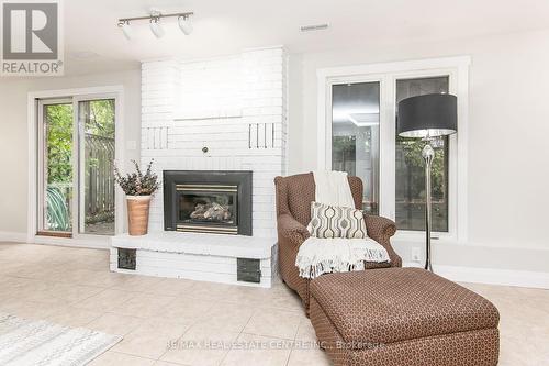 6 - 511 Oakvale Drive, Waterloo, ON - Indoor With Fireplace