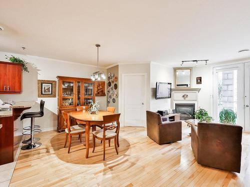 Dining room - 101-3050 Boul. Notre-Dame, Laval (Chomedey), QC - Indoor With Fireplace