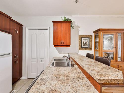 Kitchen - 101-3050 Boul. Notre-Dame, Laval (Chomedey), QC - Indoor Photo Showing Kitchen With Double Sink