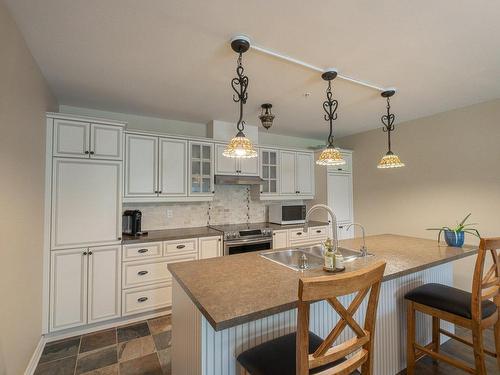 Cuisine - 4449 Rue De Lanaudière, Longueuil (Saint-Hubert), QC - Indoor Photo Showing Kitchen With Double Sink