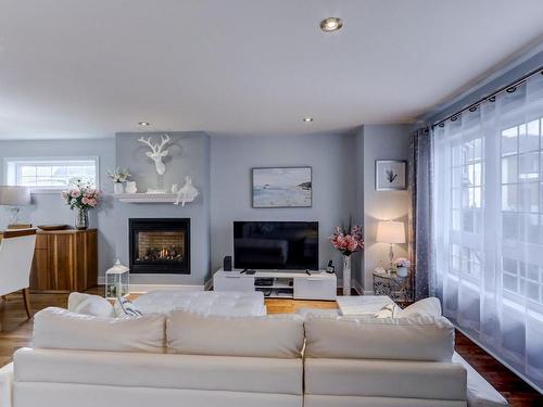 Salon - 1734 Rue Championnet, Saint-Jérôme, QC - Indoor Photo Showing Living Room With Fireplace