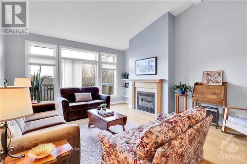 120 Passageway, Ottawa, ON - Indoor Photo Showing Living Room With Fireplace