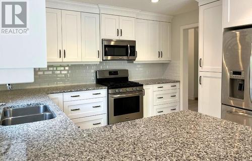 250 Meadowlark Lane, Sarnia, ON - Indoor Photo Showing Kitchen With Double Sink With Upgraded Kitchen