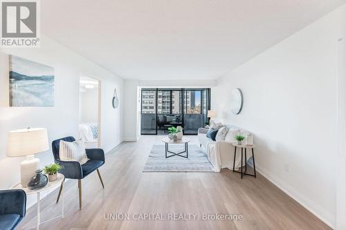 611 - 2350 Bridletowne Circle, Toronto, ON - Indoor Photo Showing Living Room