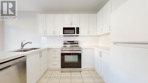 6 Planter Crescent, Vaughan, ON - Indoor Photo Showing Kitchen With Double Sink