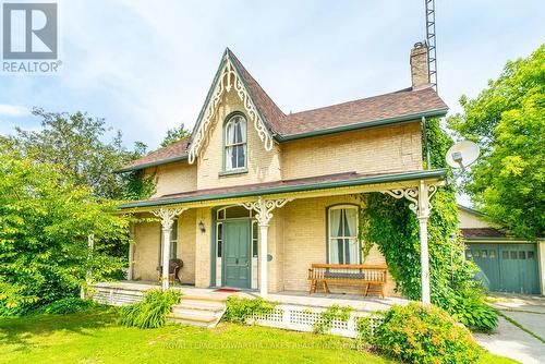 1167 Hwy 7, Kawartha Lakes, ON - Outdoor With Deck Patio Veranda With Facade