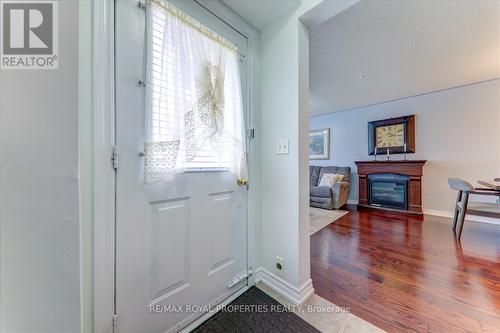 99 Mondeo Drive, Toronto, ON - Indoor Photo Showing Other Room With Fireplace