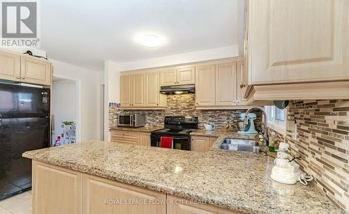 18 Prouse Drive, Brampton, ON - Indoor Photo Showing Kitchen With Double Sink