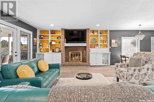 1619 Pascoe Crescent, Moose Jaw, SK - Indoor Photo Showing Living Room With Fireplace