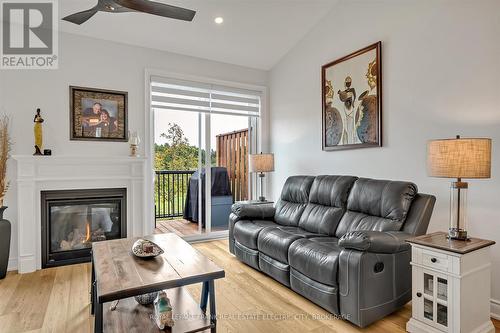 100 - 80 Marsh Avenue, Peterborough (Northcrest), ON - Indoor Photo Showing Living Room With Fireplace