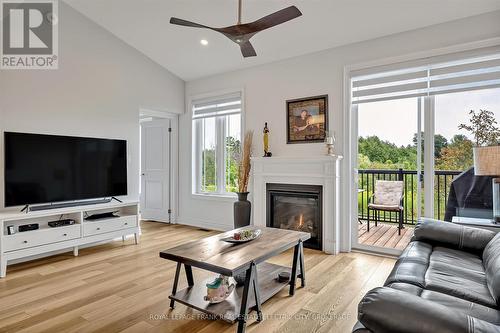 100 - 80 Marsh Avenue, Peterborough (Northcrest), ON - Indoor Photo Showing Living Room With Fireplace