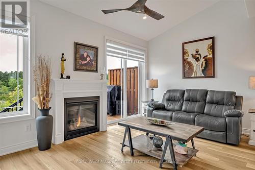 100 - 80 Marsh Avenue, Peterborough (Northcrest), ON - Indoor Photo Showing Living Room With Fireplace