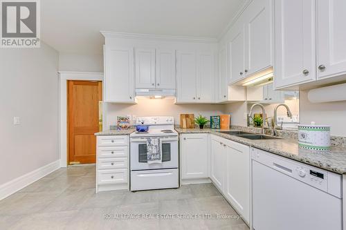 1 - 63 High Park Boulevard, Toronto, ON - Indoor Photo Showing Kitchen With Double Sink