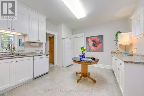 1 - 63 High Park Boulevard, Toronto, ON - Indoor Photo Showing Kitchen With Double Sink