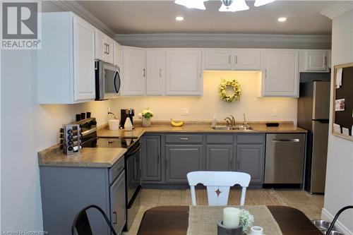 26 Winding Woods Crescent, London, ON - Indoor Photo Showing Kitchen With Double Sink