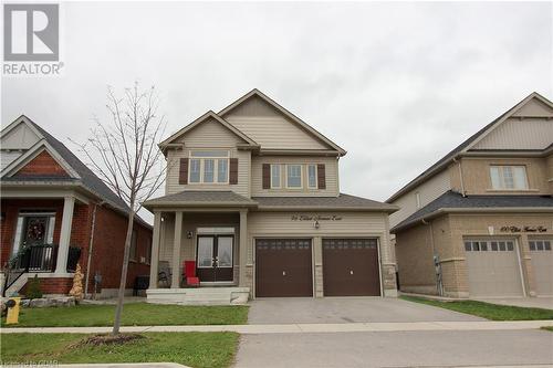 Craftsman inspired home featuring a garage and a front yard - 96 Elliot Avenue E, Fergus, ON - Outdoor With Facade