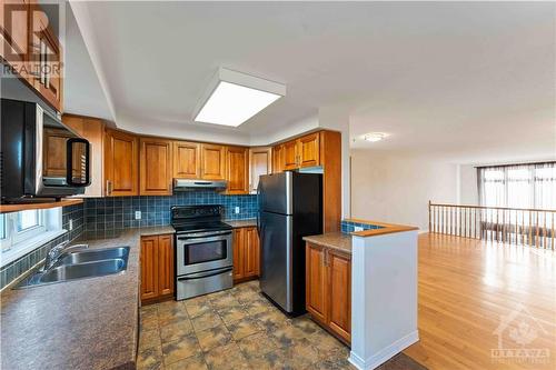 1512 Walkley Road Unit#80, Ottawa, ON - Indoor Photo Showing Kitchen With Double Sink