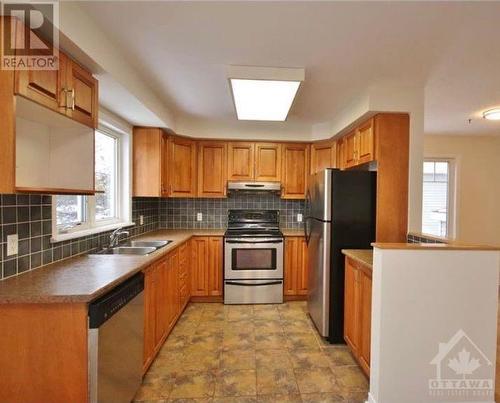 1512 Walkley Road Unit#80, Ottawa, ON - Indoor Photo Showing Kitchen With Double Sink