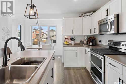 734 Kolynchuk Court, Saskatoon, SK - Indoor Photo Showing Kitchen With Double Sink